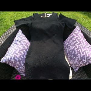 Michael Kor’s Black Comfy Dress with gold accent